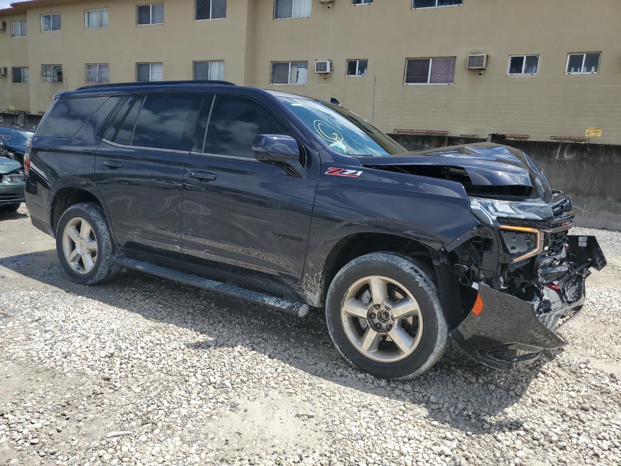 Photo 3 VIN: 1GNSKPKD3PR322494 - CHEVROLET TAHOE 