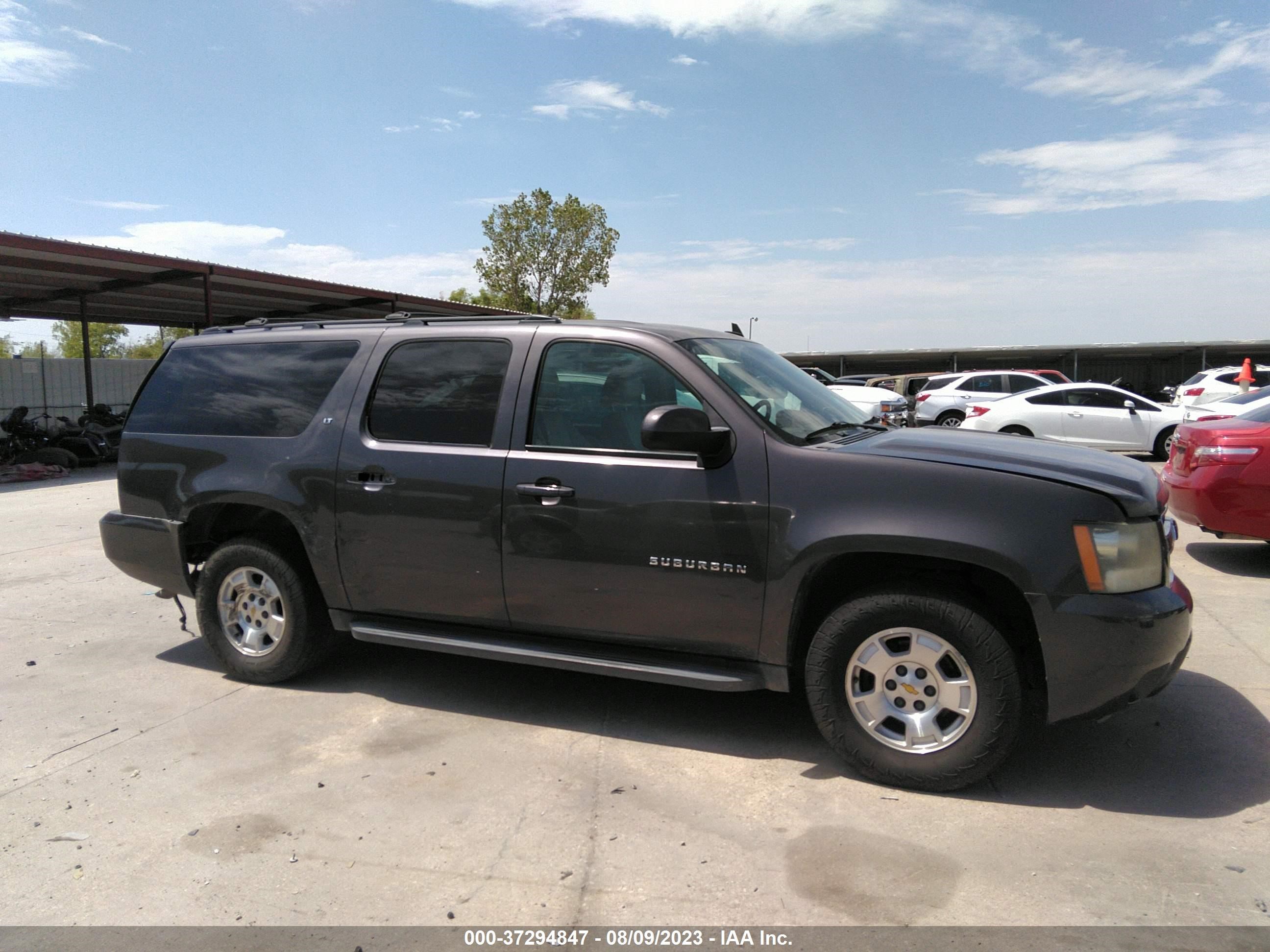 Photo 12 VIN: 1GNUCJE04AR273857 - CHEVROLET SUBURBAN 