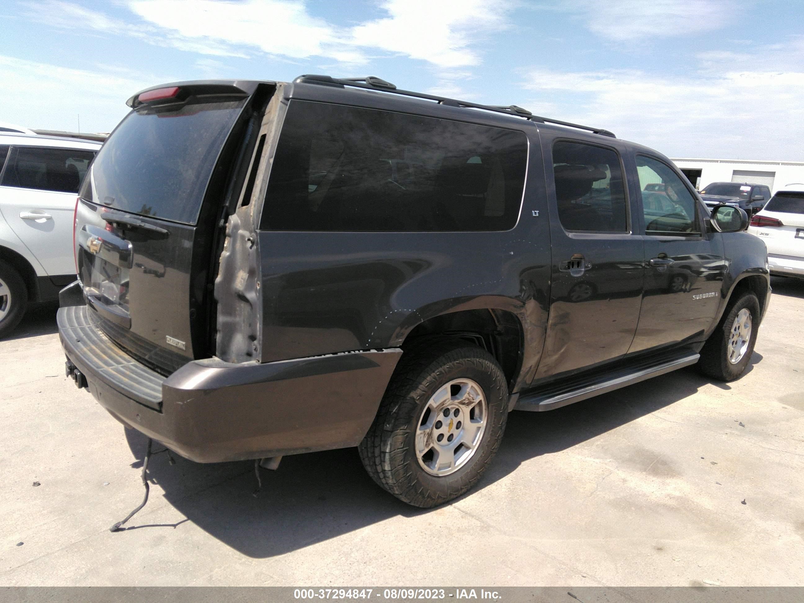 Photo 5 VIN: 1GNUCJE04AR273857 - CHEVROLET SUBURBAN 