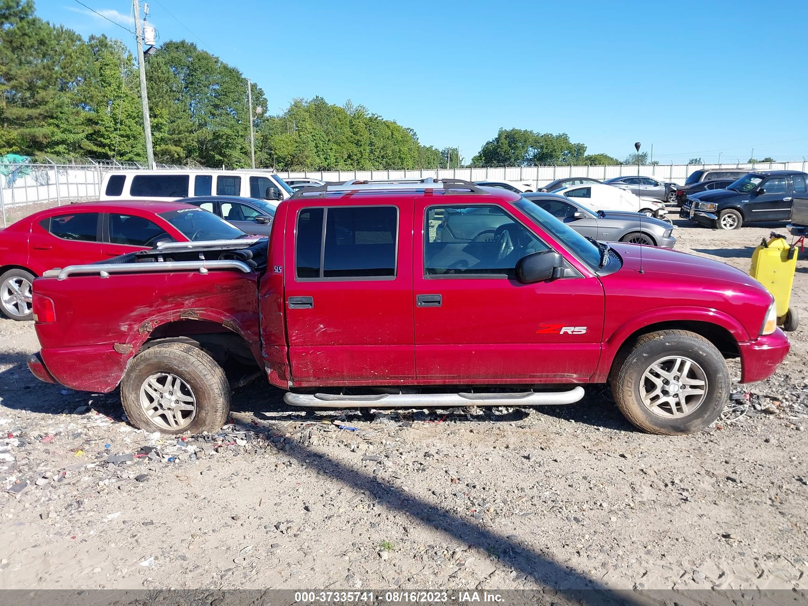 Photo 12 VIN: 1GTDT13X74K115650 - GMC SONOMA 