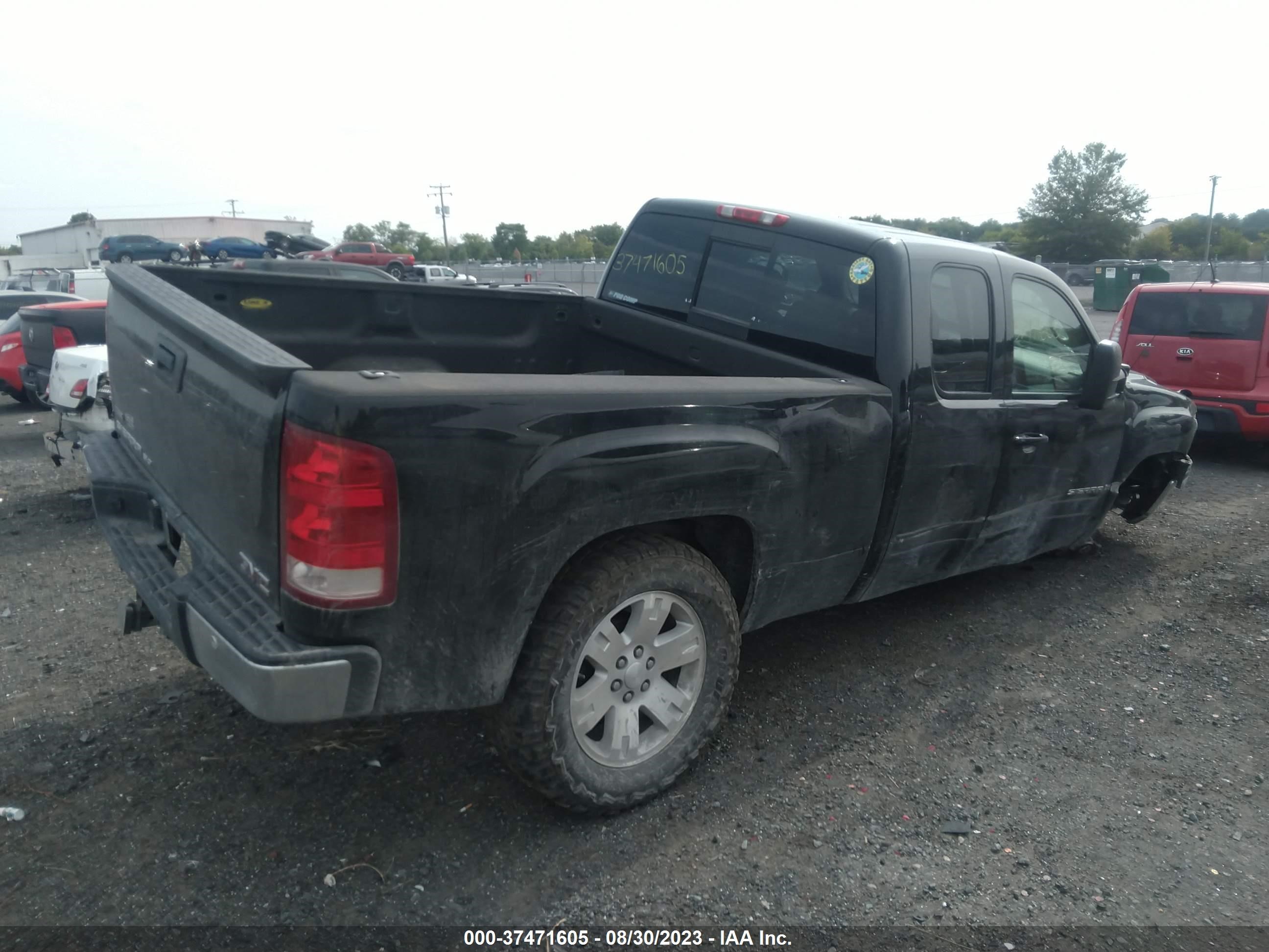 Photo 3 VIN: 1GTEK190X7Z555035 - GMC SIERRA 