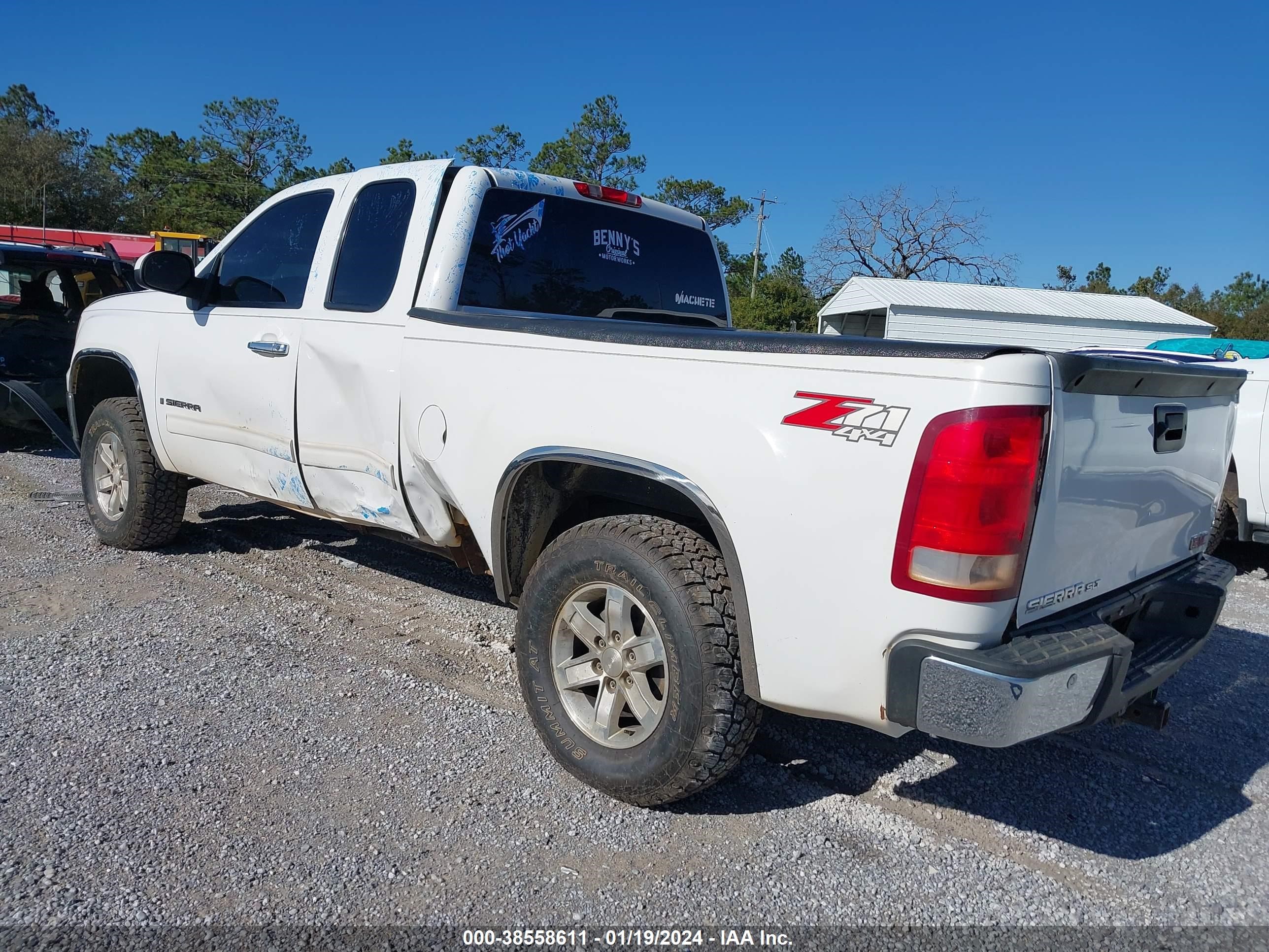 Photo 2 VIN: 1GTEK39J39Z275058 - GMC SIERRA 