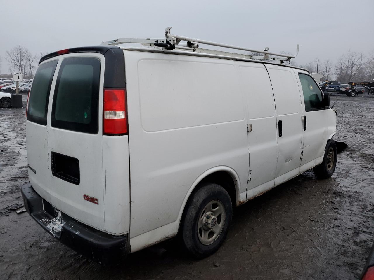 Photo 2 VIN: 1GTFG15X751233814 - GMC SAVANA 