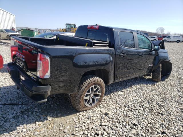 Photo 3 VIN: 1GTG6FEN2M1123366 - GMC CANYON AT4 