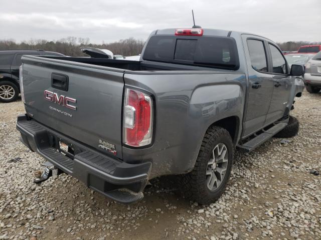 Photo 3 VIN: 1GTG6FEN3M1180062 - GMC CANYON AT4 