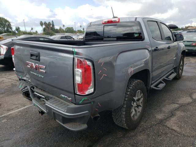 Photo 3 VIN: 1GTG6FEN5M1118999 - GMC CANYON AT4 