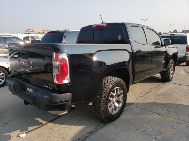 Photo 3 VIN: 1GTG6FENXM1208679 - GMC CANYON AT4 