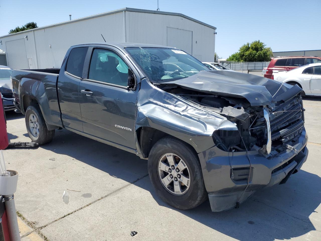 Photo 3 VIN: 1GTH5AE34F1157112 - GMC CANYON 