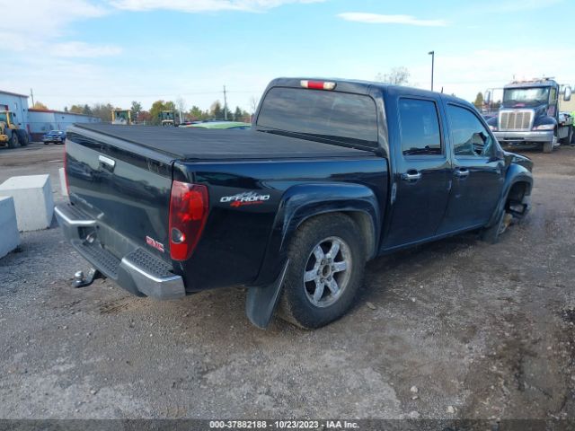 Photo 3 VIN: 1GTH6MFE8B8125053 - GMC CANYON 