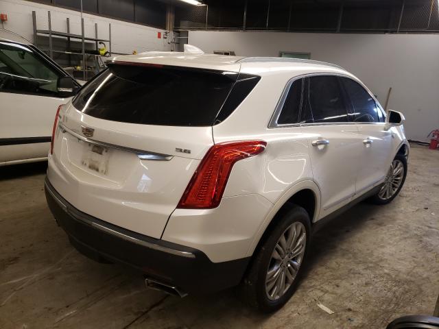 Photo 3 VIN: 1GYFNBRSXHZ100040 - CADILLAC XT5 LUXURY 