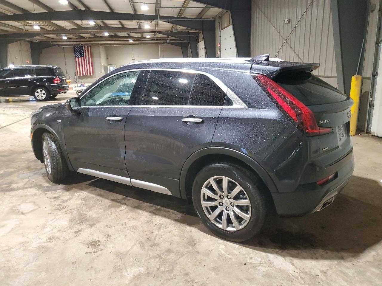 Photo 1 VIN: 1GYFZDR49PF100466 - CADILLAC XT4 