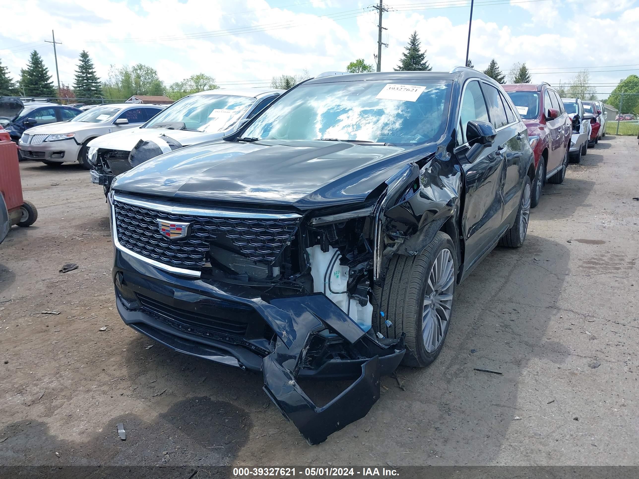 Photo 1 VIN: 1GYFZDR49RF100132 - CADILLAC XT4 