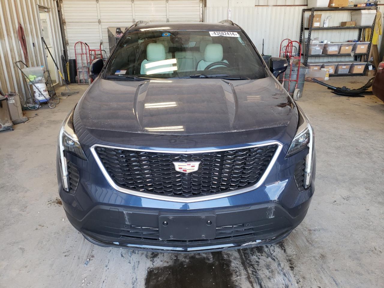 Photo 4 VIN: 1GYFZER40NF140390 - CADILLAC XT4 