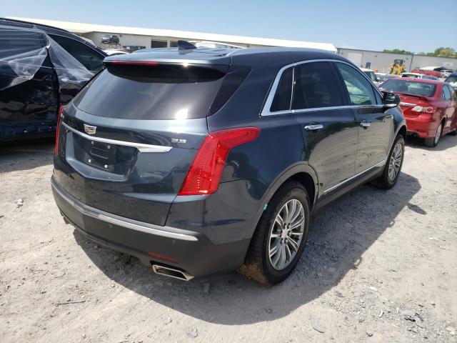 Photo 3 VIN: 1GYKNCRS0KZ174899 - CADILLAC XT5 LUXURY 