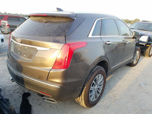 Photo 3 VIN: 1GYKNCRS1KZ196927 - CADILLAC XT5 LUXURY 