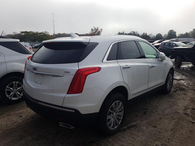 Photo 3 VIN: 1GYKNCRS4KZ116665 - CADILLAC XT5 LUXURY 