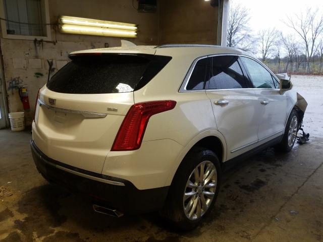 Photo 3 VIN: 1GYKNCRS4KZ148760 - CADILLAC XT5 LUXURY 