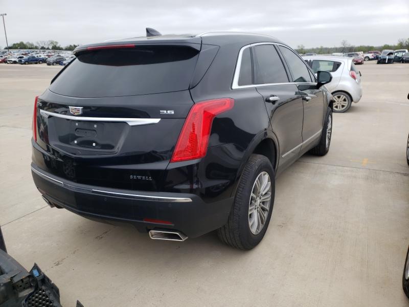 Photo 3 VIN: 1GYKNCRS4KZ231976 - CADILLAC XT5 LUXURY 