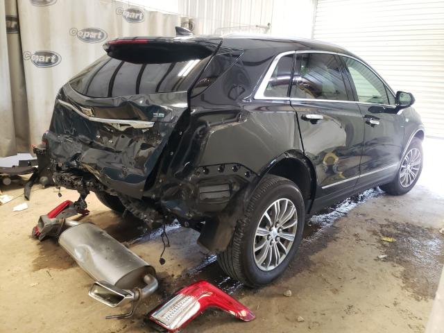 Photo 3 VIN: 1GYKNCRS8KZ276886 - CADILLAC XT5 LUXURY 