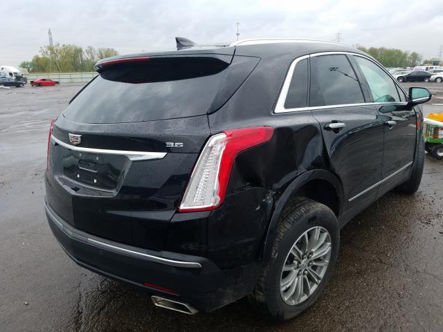 Photo 3 VIN: 1GYKNCRS9JZ162796 - CADILLAC XT5 LUXURY 