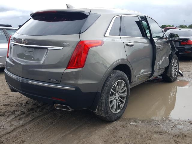 Photo 3 VIN: 1GYKNCRSXJZ161141 - CADILLAC XT5 LUXURY 