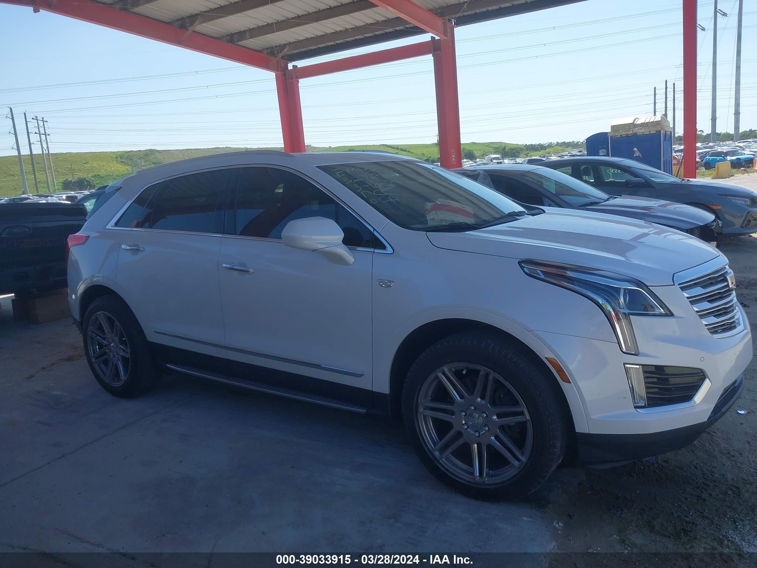 Photo 12 VIN: 1GYKNCRSXJZ201010 - CADILLAC XT5 