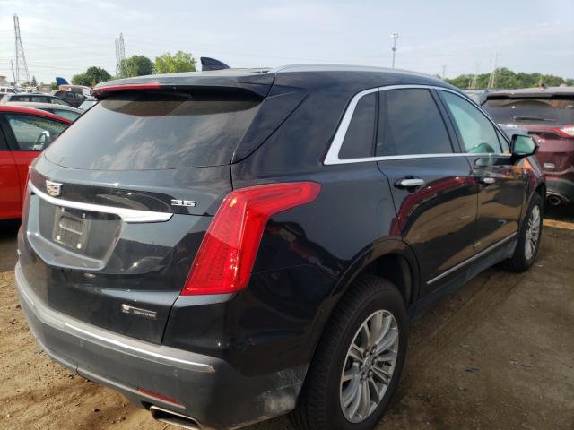 Photo 3 VIN: 1GYKNDRS3KZ162557 - CADILLAC XT5 LUXURY 