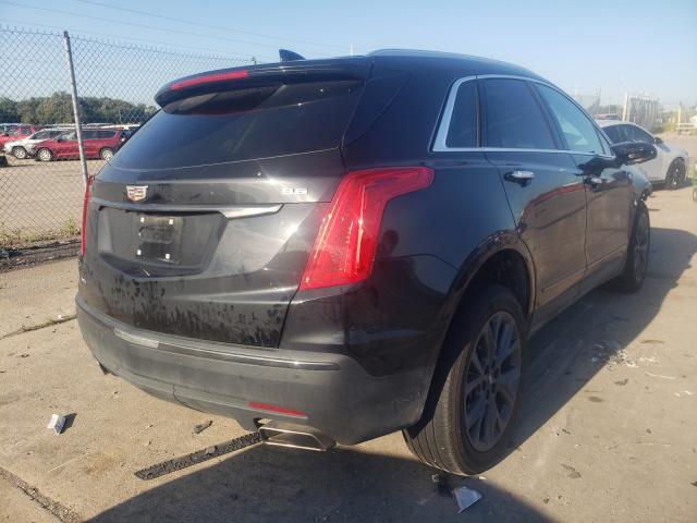 Photo 3 VIN: 1GYKNDRS3KZ233871 - CADILLAC XT5 LUXURY 