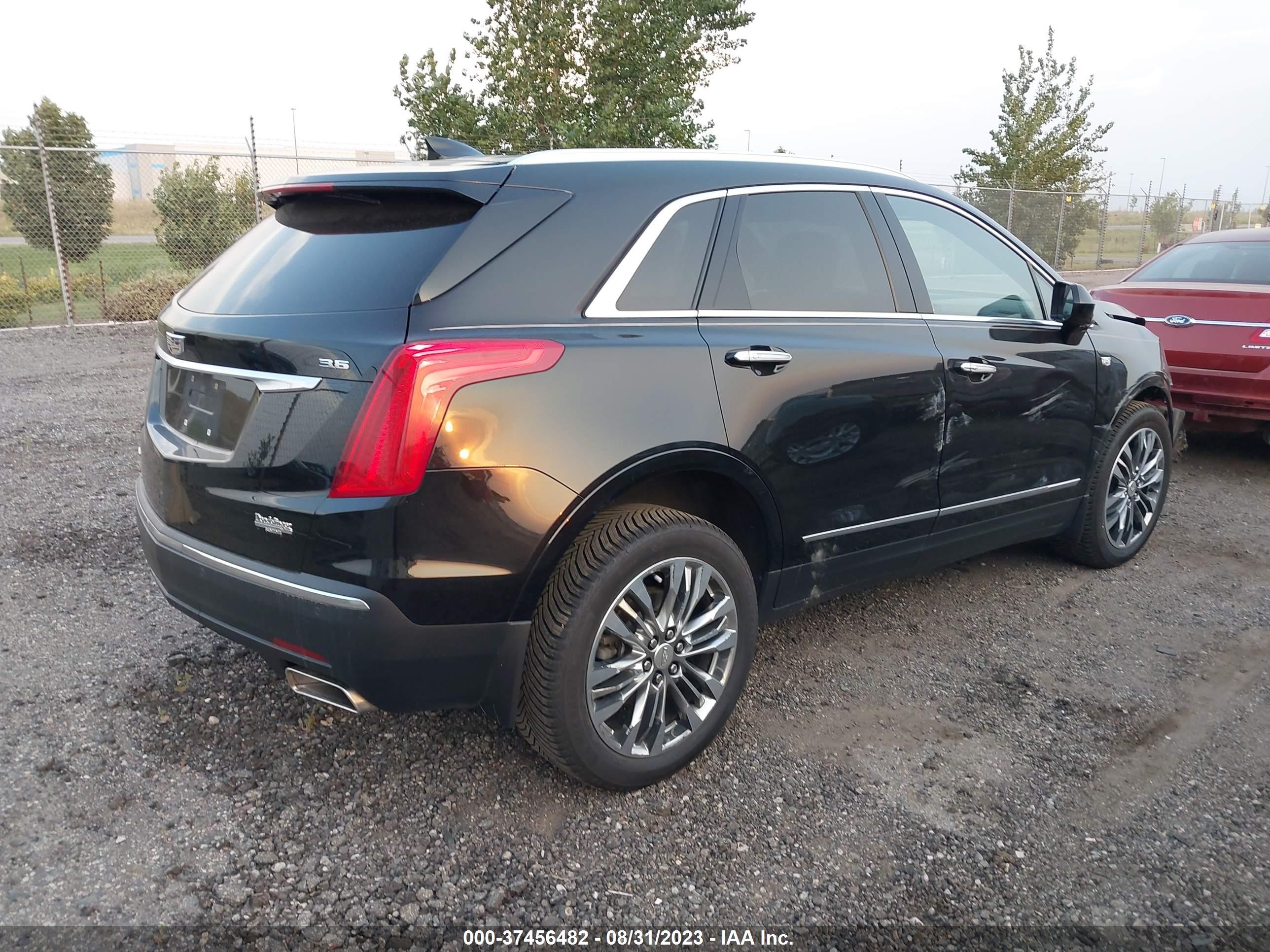 Photo 3 VIN: 1GYKNERS3HZ104382 - CADILLAC XT5 