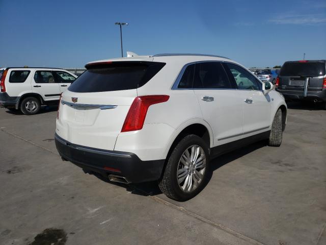 Photo 3 VIN: 1GYKNERS7HZ310904 - CADILLAC XT5 PREMIU 