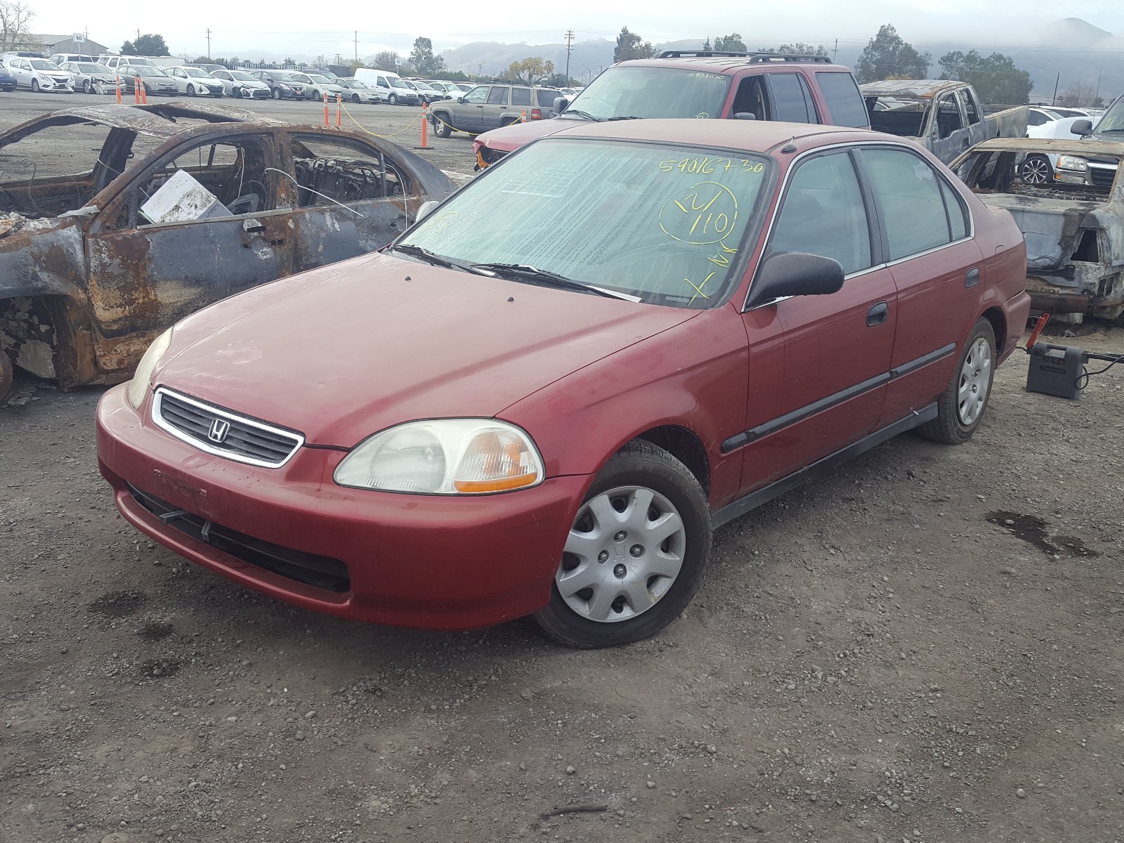 Photo 1 VIN: 1HGEJ6570WL031124 - HONDA CIVIC LX 