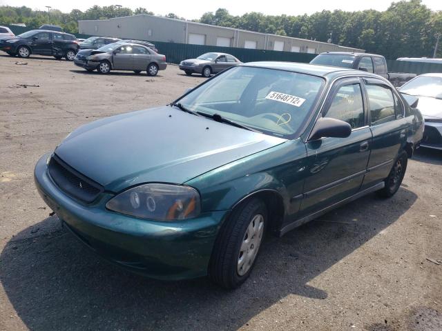 Photo 1 VIN: 1HGEJ6571YL025416 - HONDA CIVIC LX 