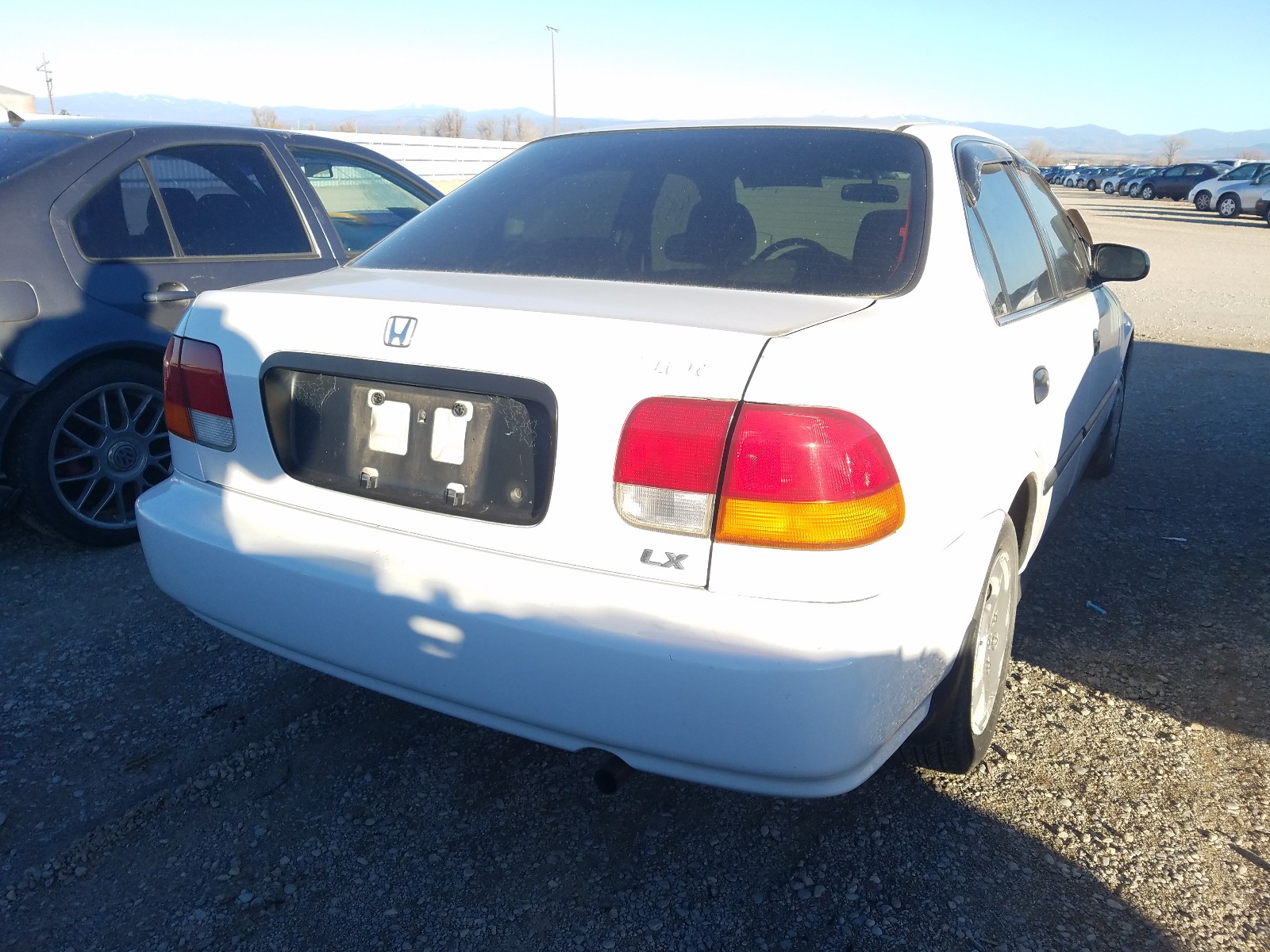 Photo 3 VIN: 1HGEJ6578VL034058 - HONDA CIVIC LX 