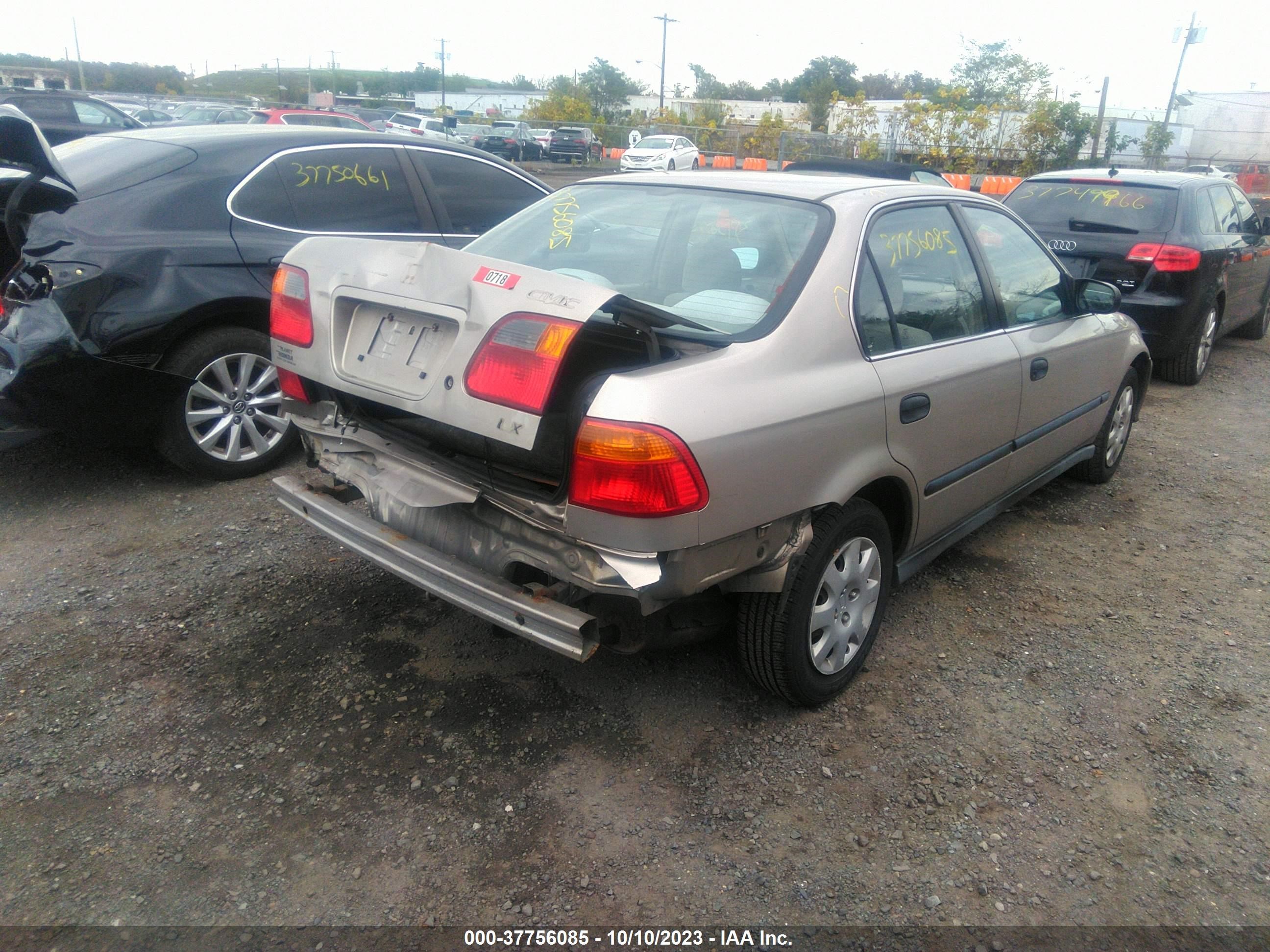 Photo 3 VIN: 1HGEJ6673YL055712 - HONDA CIVIC 