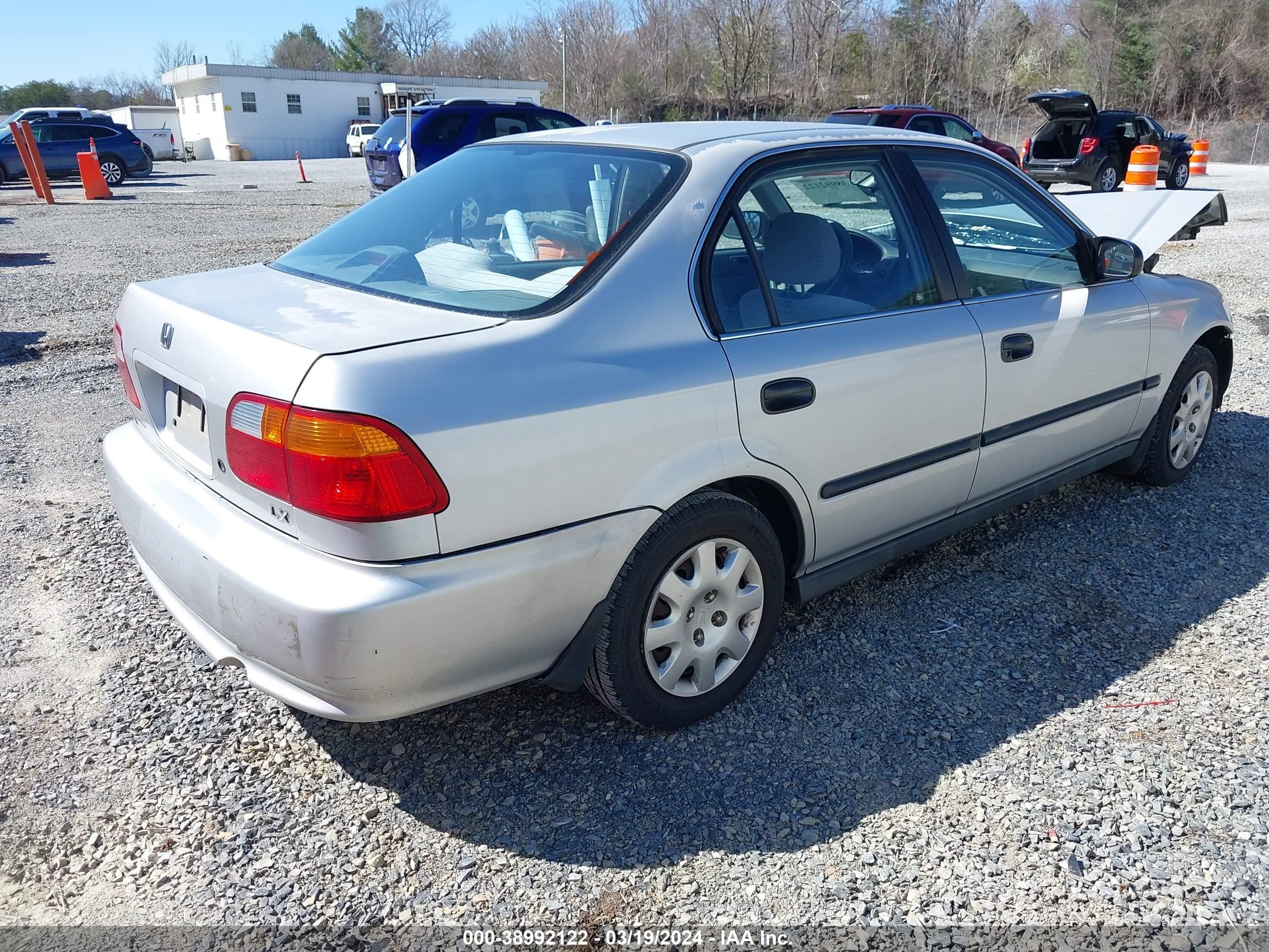 Photo 3 VIN: 1HGEJ6674XL031823 - HONDA CIVIC 