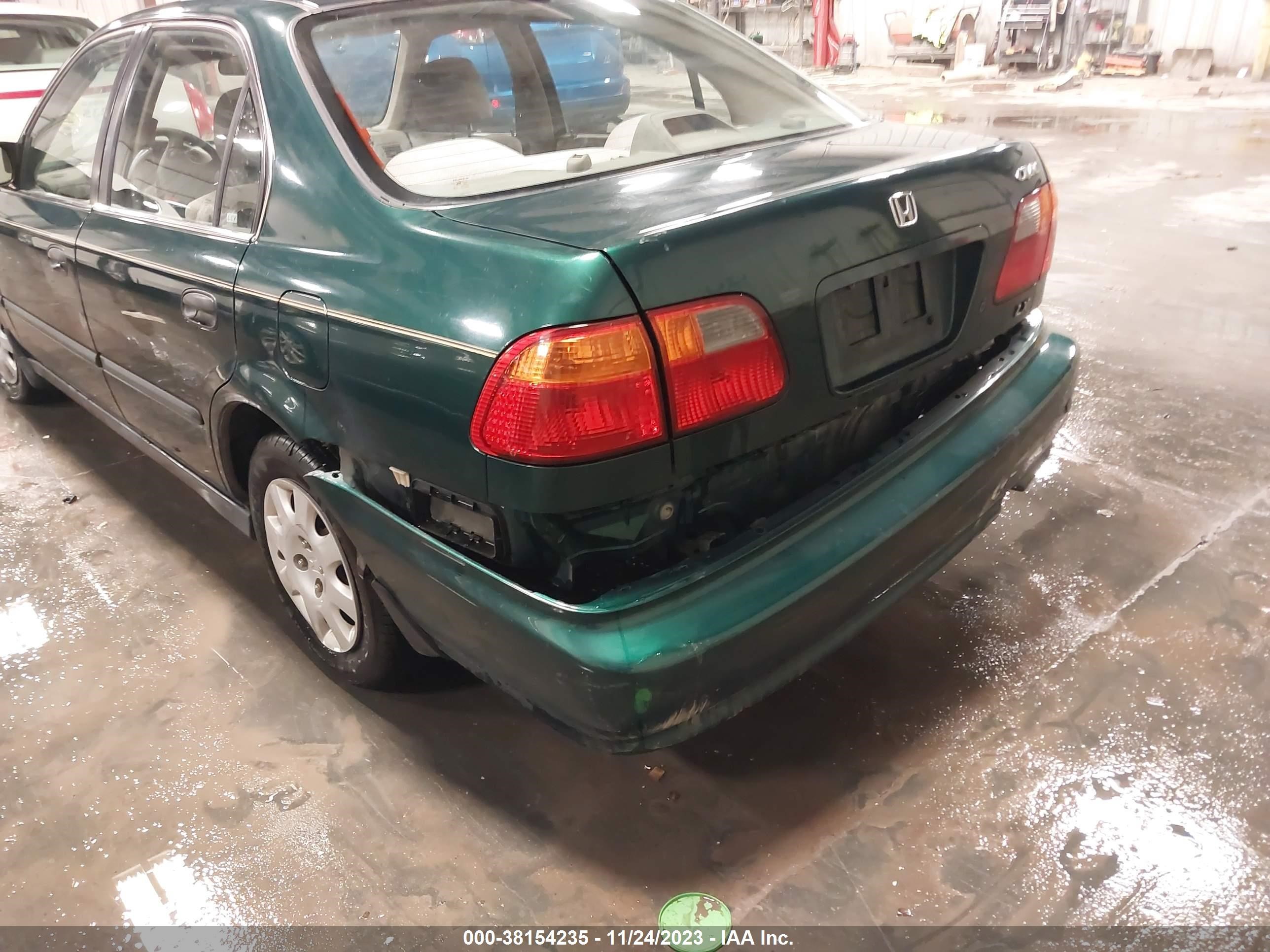 Photo 5 VIN: 1HGEJ6674YL068503 - HONDA CIVIC 