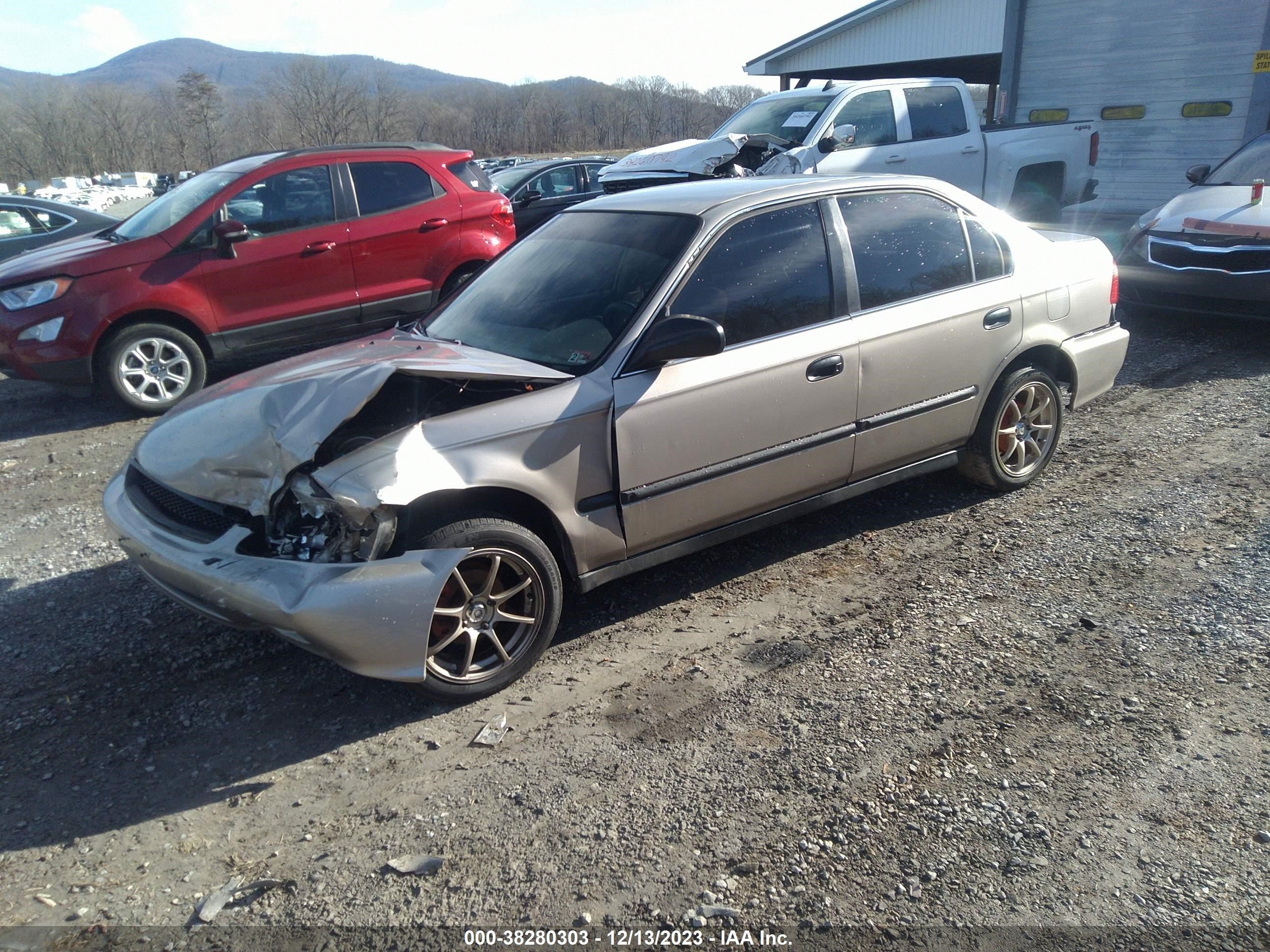 Photo 1 VIN: 1HGEJ6677YL067765 - HONDA CIVIC 