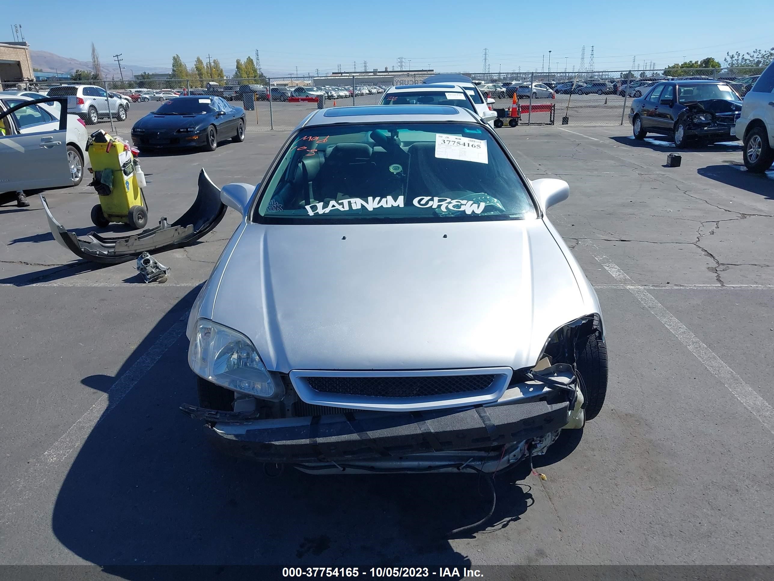 Photo 11 VIN: 1HGEJ8145XL074401 - HONDA CIVIC 