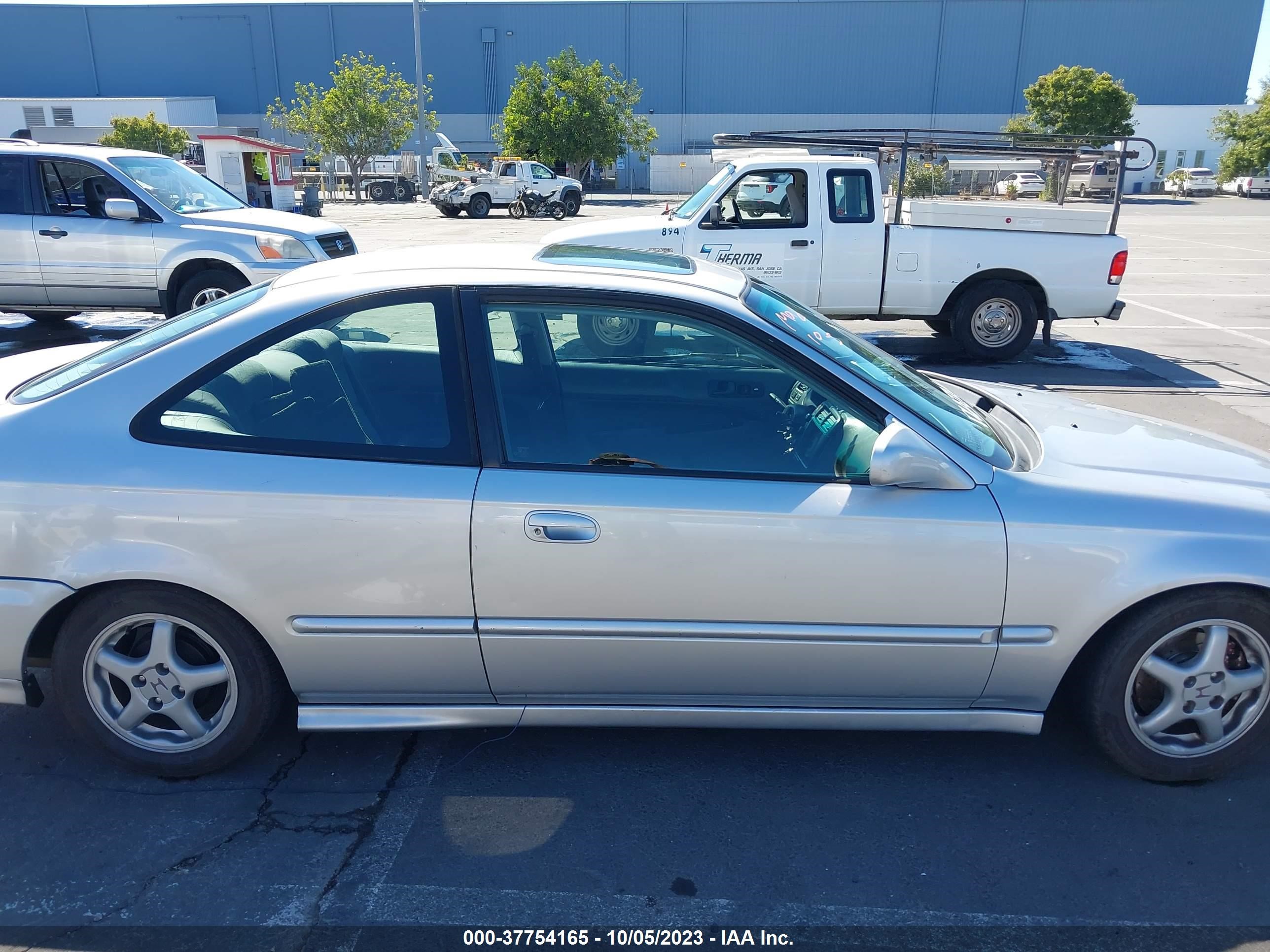 Photo 12 VIN: 1HGEJ8145XL074401 - HONDA CIVIC 