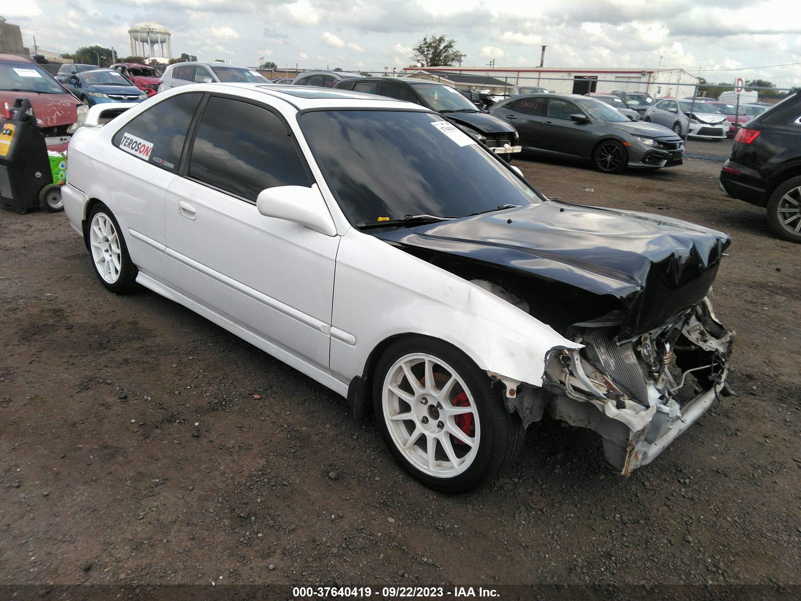 Photo 0 VIN: 1HGEJ8241YL021310 - HONDA CIVIC 