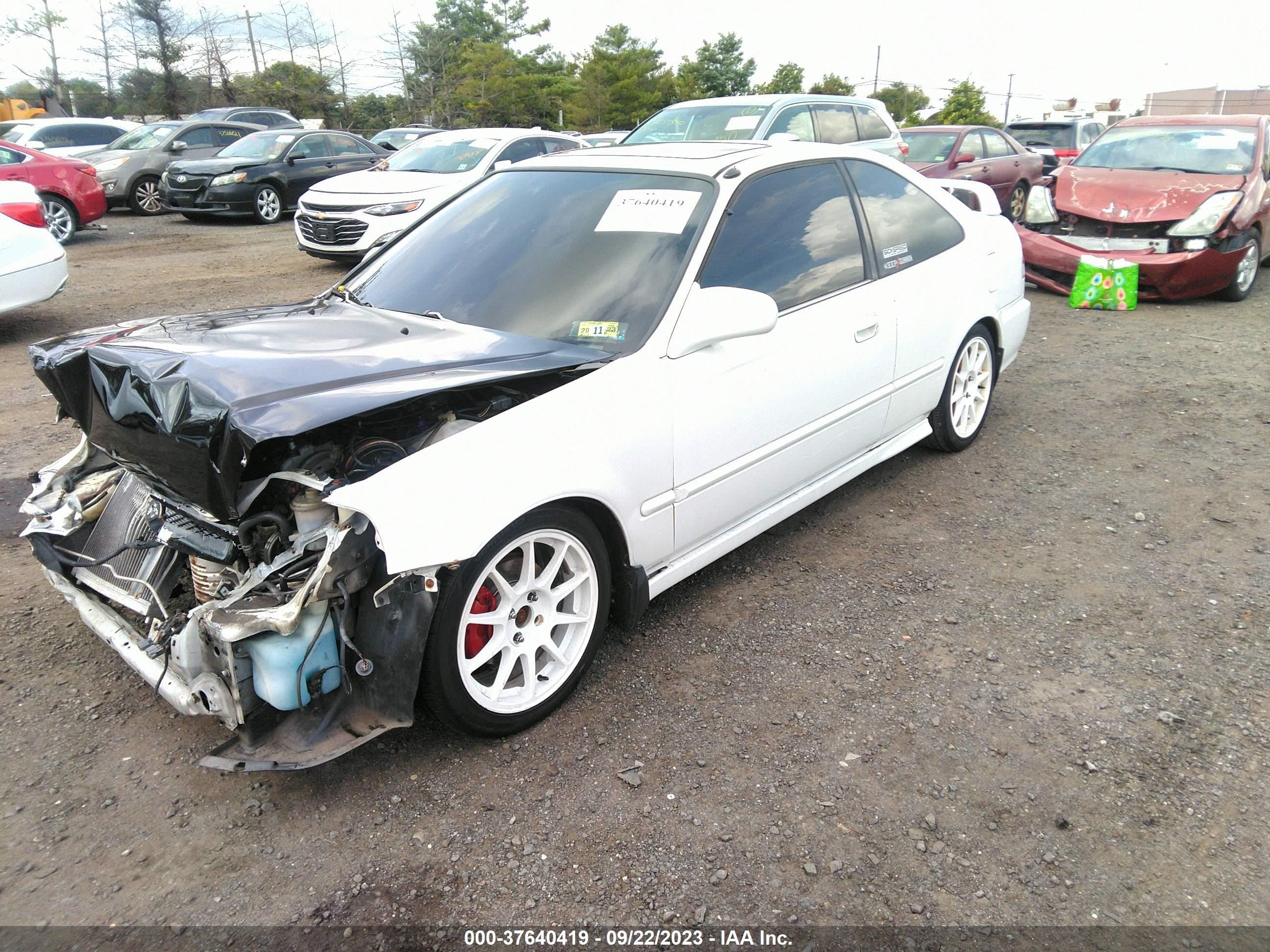 Photo 1 VIN: 1HGEJ8241YL021310 - HONDA CIVIC 