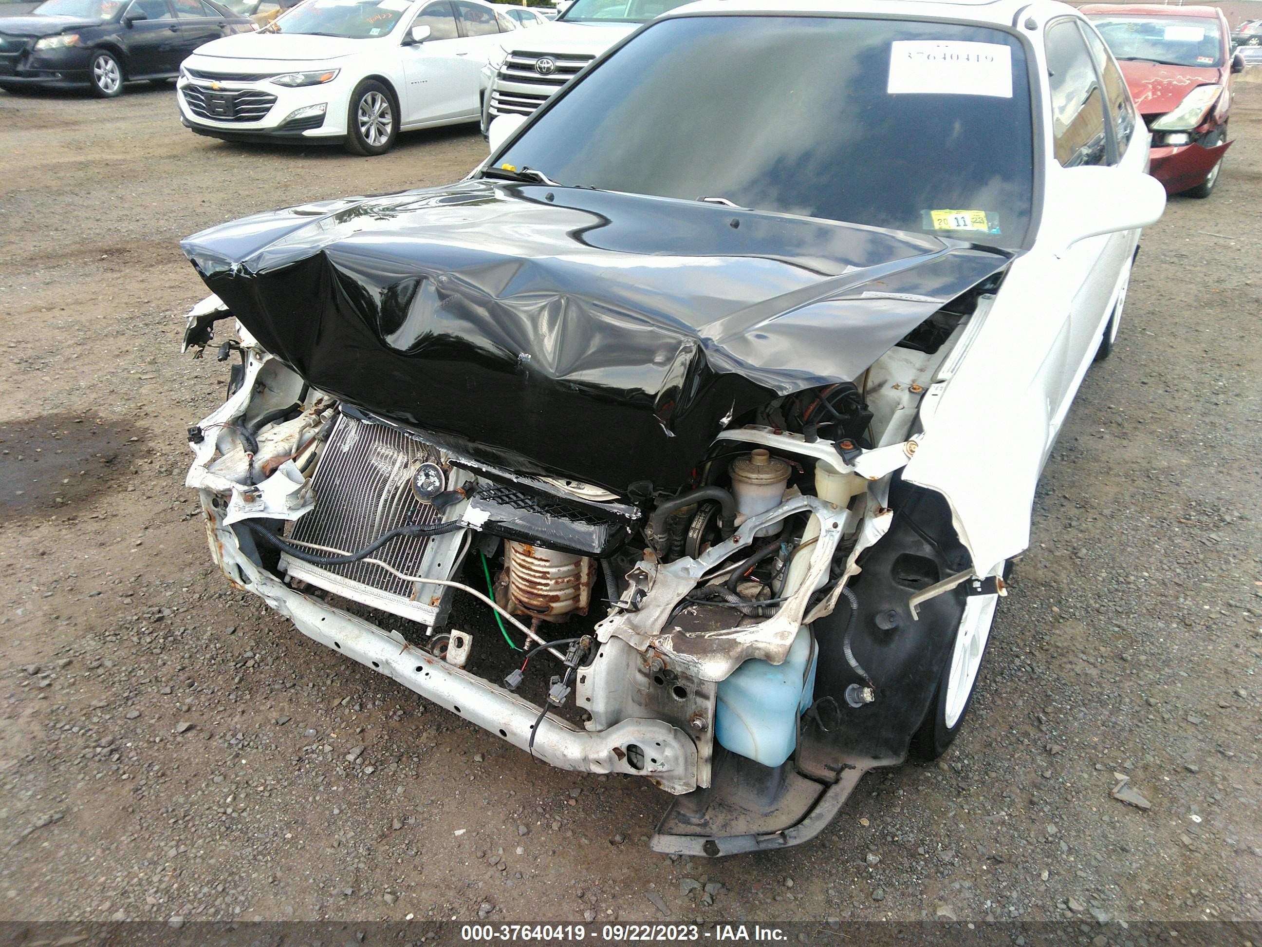 Photo 5 VIN: 1HGEJ8241YL021310 - HONDA CIVIC 