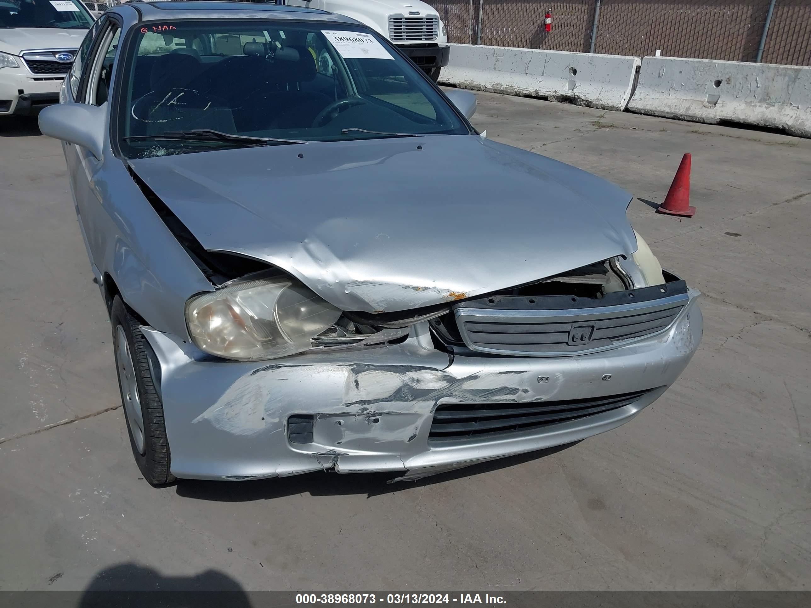 Photo 5 VIN: 1HGEJ8243YL113745 - HONDA CIVIC 