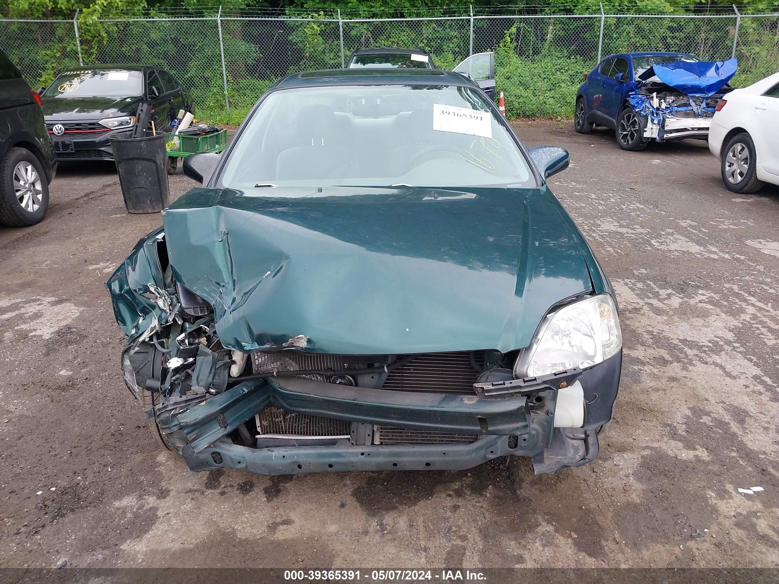 Photo 12 VIN: 1HGEJ8245YL066119 - HONDA CIVIC 