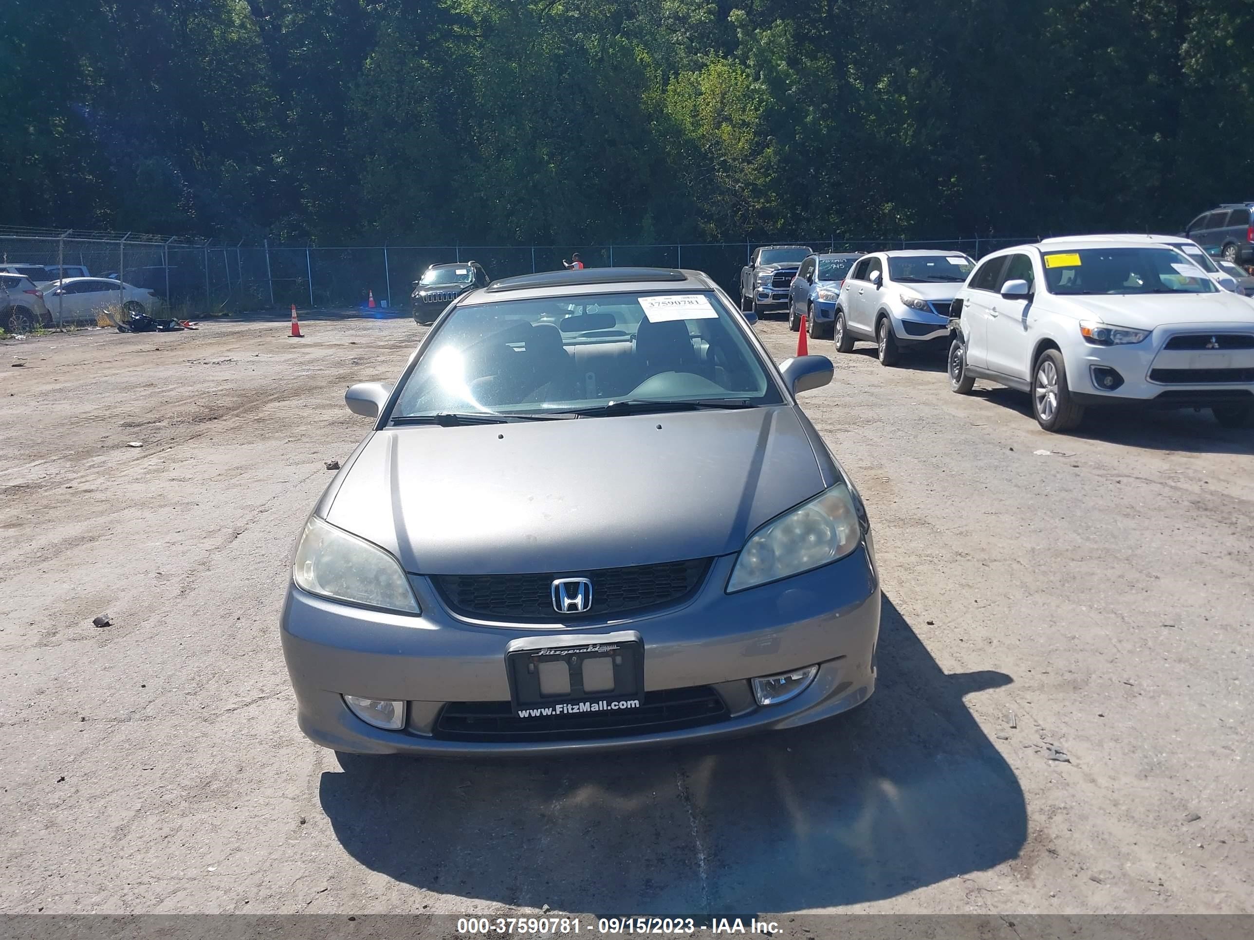 Photo 11 VIN: 1HGEM21974L006628 - HONDA CIVIC 