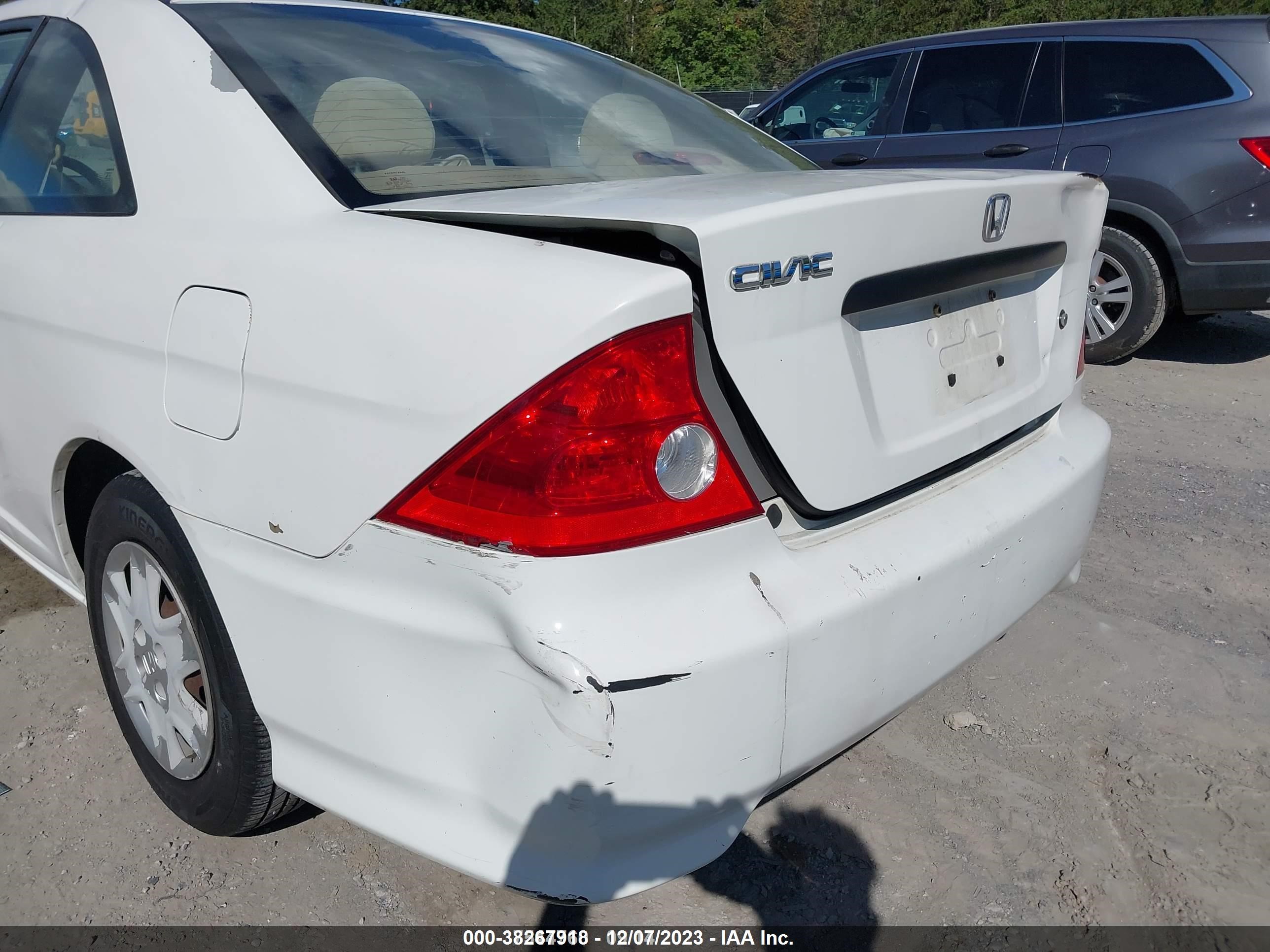 Photo 5 VIN: 1HGEM22174L007061 - HONDA CIVIC 