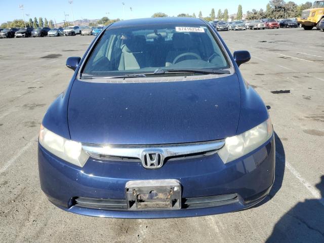 Photo 4 VIN: 1HGFA16517L079088 - HONDA CIVIC LX 