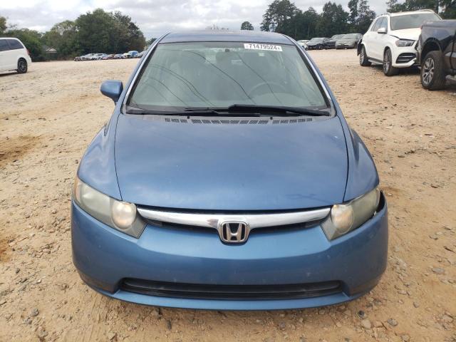 Photo 4 VIN: 1HGFA16517L141802 - HONDA CIVIC LX 