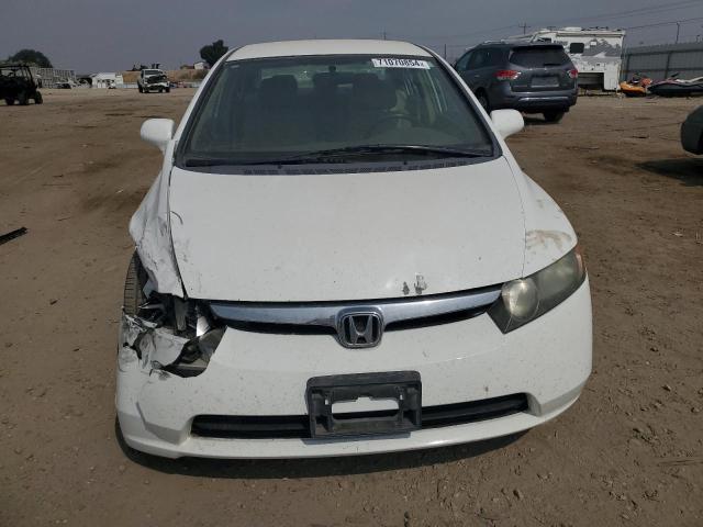 Photo 4 VIN: 1HGFA16517L142206 - HONDA CIVIC LX 