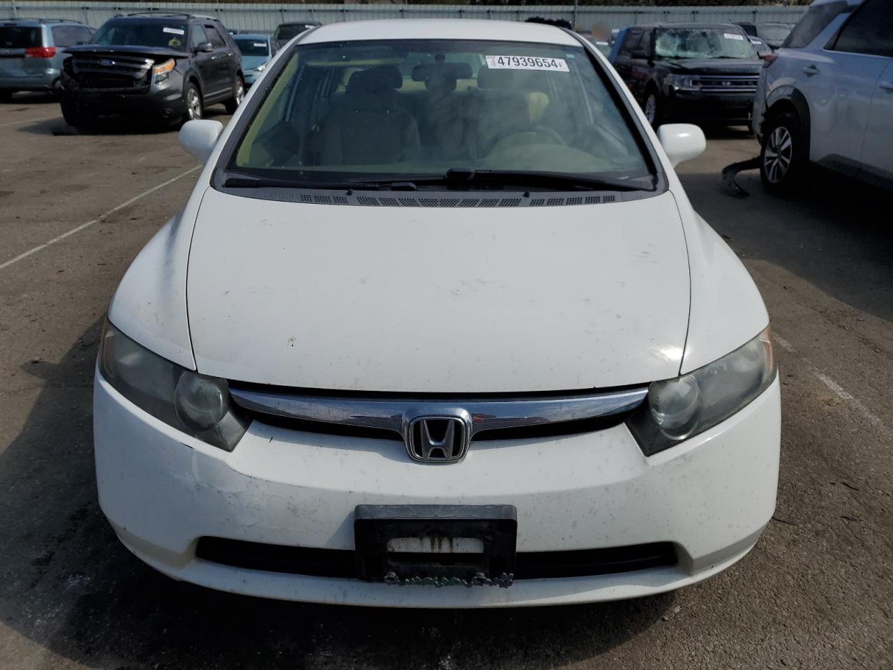 Photo 4 VIN: 1HGFA16517L142237 - HONDA CIVIC 